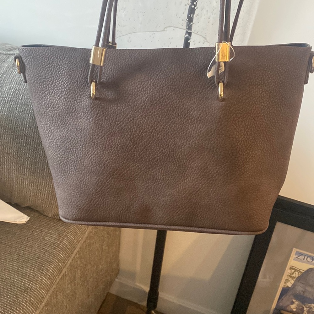 Brand now mauve ish colored bag